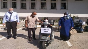 Sorgun HEM akülü araç ve tekerlekli sandalye dağıttı