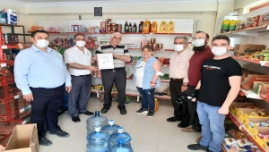 MÜSİAD Eskişehir Şubesi, ihtiyaç sahibi ailelerin borçlarını "zimem defteri" geleneğiyle ödedi