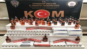 Eskişehir'de bir evde kaçak içki ve sigaralar ele geçirildi