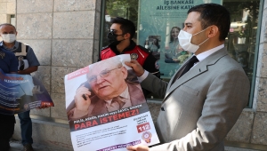 Niğde'de polis ekipleri, dolandırıcılığa karşı bankalara bilgilendirici afiş astı