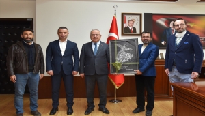 SÜ ve NEÜ öğretim üyelerinden Rektör AK'a ziyaret