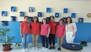 Mevlana Vali Zübeyir Kemelek Ortaokulu'nda kitaplık ve sergi açılışı yapıldı