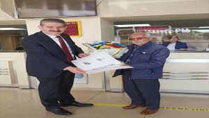 Karaman'da PTT'den kuruluş yılına özel 182. müşteriye hediye verildi