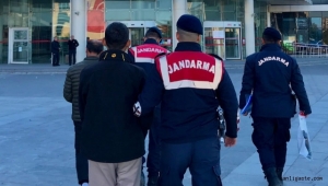Kayseri'de aranan kişi kamu malına zarar vermek isterken yakalandı